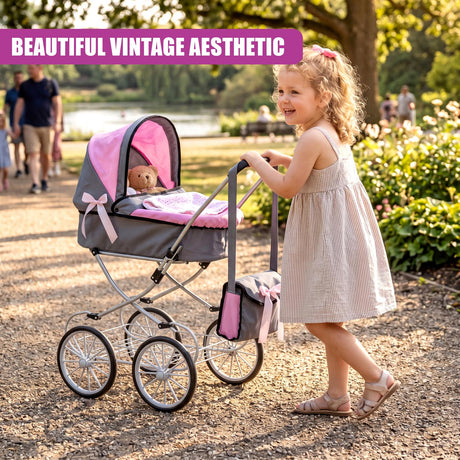 Little girl standing next to a grey and pink doll's pram in a grassy outdoor setting.