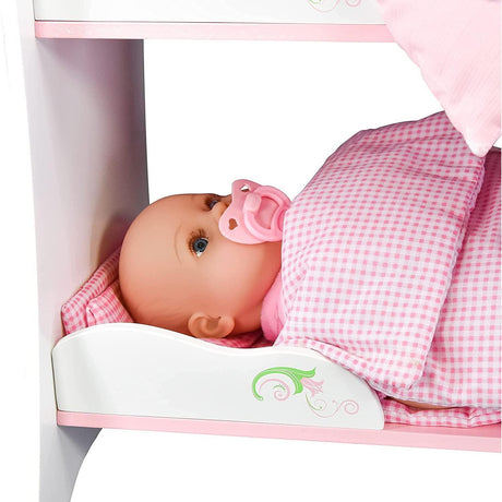 "Baby doll resting in a pink baby crib." - UKBuyZone