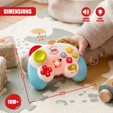 Game controller toy held by a baby wearing a light-coloured sweater, on a patterned play mat
