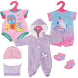Purple and pink baby doll clothes set with diaper, pants, t-shirt, shorts, socks, and hoodie. Includes a small baby doll. Ideal for young children to dress up their dolls. Set of 6 doll clothes with different colors and patterns. Perfect for playtime and imaginative roleplaying. Comes in a set with accessories. - UKBuyZone