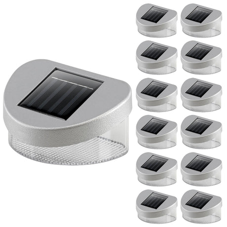 Multiple solar-powered outdoor lights, ranging in size, featuring rectangular black photovoltaic panels.