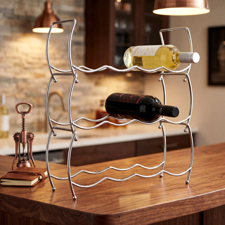 Two-tiered silver wine rack displaying multiple bottles of wine on a wooden surface.