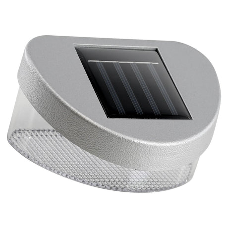 Outdoor solar fence light fixture featuring dark panels and a translucent, textured front diffuser.