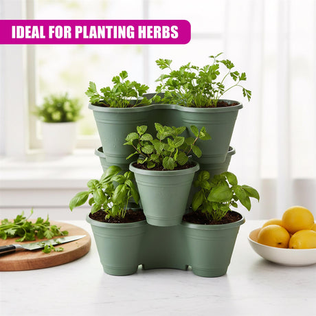 Tiered, stackable planters hold multiple pots of various green herbs and plants.