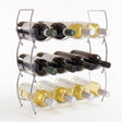 Three-tiered wire wine storage rack displaying various bottles of red and white wine.