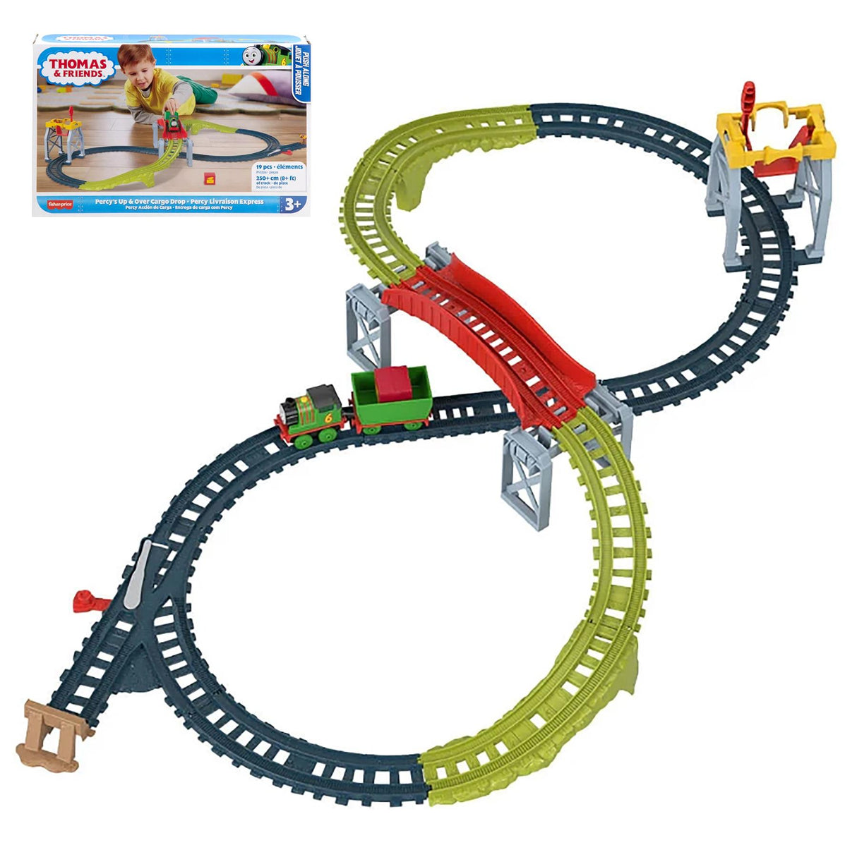 The assembled train tracks form an intricate loop with a red drop section and cargo loading area.