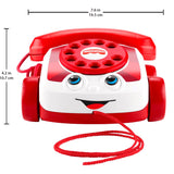 White and red toy rotary telephone featuring a handset and attached connecting cord.