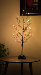 A tree light on a table.